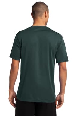 A man is wearing a dark green Port & Company Performance Tee, viewed from the back. The shirt features a logo.
