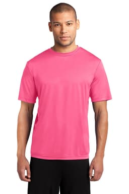 A man is wearing a vibrant pink Performance Tee, featuring short sleeves and a logo on the chest.