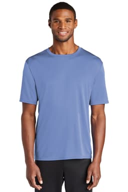 A man wearing a blue performance tee in a casual pose. The shirt has a logo on the front.