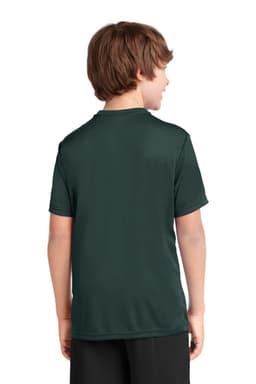 A youth performance T-shirt in dark green, featuring a logo on the back, worn by a child.