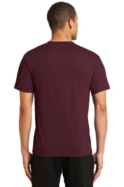 A maroon performance blend t-shirt with a small logo on the back, featuring a classic crew neck design.