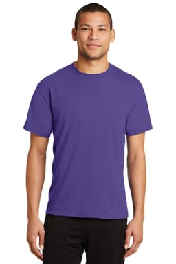 A man stands wearing a short-sleeved purple performance blend t-shirt, featuring a branding logo.