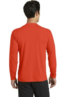 A long sleeve performance blend tee in bright red, featuring a plain back and a logo on the upper section.