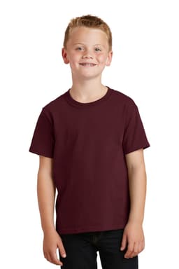 A youth core cotton tee in burgundy, featuring a plain design and short sleeves, worn by a smiling child.