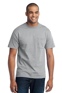 A man wearing a grey t-shirt with a pocket, standing and smiling. The shirt has a logo on it.