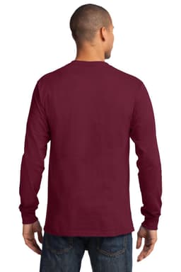 A man stands wearing a burgundy long sleeve essential tee, with his back to the camera. The shirt features a logo.