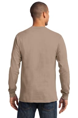 A model wearing a long-sleeve essential tee in beige, featuring a logo on the back.