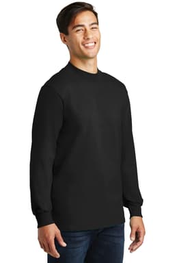 A black mock turtleneck shirt is displayed on a model, featuring long sleeves and a relaxed fit.
