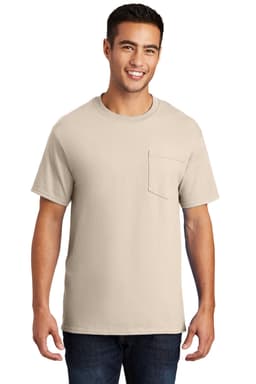 A plain beige t-shirt featuring a pocket, worn by a smiling man. The shirt has short sleeves and a classic fit.