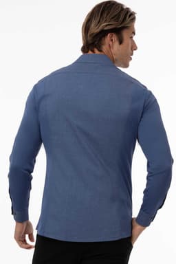 A black men's shirt with long sleeves, featuring a classic collar and a subtle branding logo.
