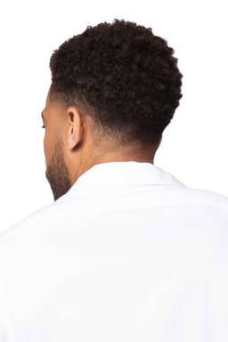 A man wearing a black Seville shirt, viewed from the back, showcasing its collar and fabric details.