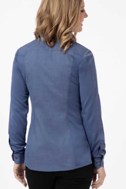 A blue women's shirt with long sleeves and a fitted back design, featuring a logo on the fabric.
