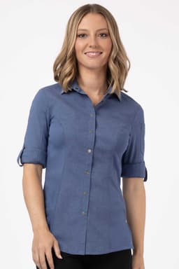 A blue women's shirt with rolled sleeves and a collared neckline, featuring a button-up design and a subtle texture.
