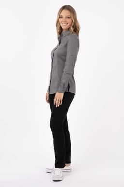 A women's shirt in grey, featuring a collar and fitted design, paired with black pants and white shoes.