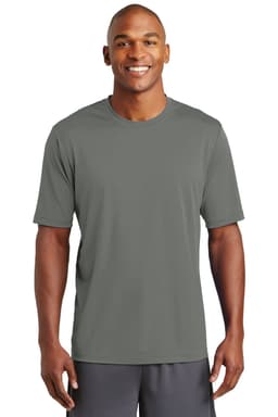 A man in a grey sports t-shirt stands smiling, featuring short sleeves and a crew neck design.