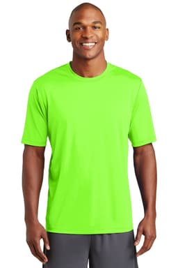 A bright green t-shirt worn by a smiling man, featuring a logo on the front.