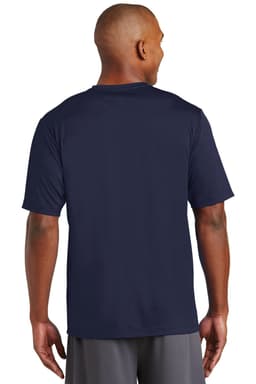 A man wearing a navy blue t-shirt, viewed from the back. The shirt has a logo on it.