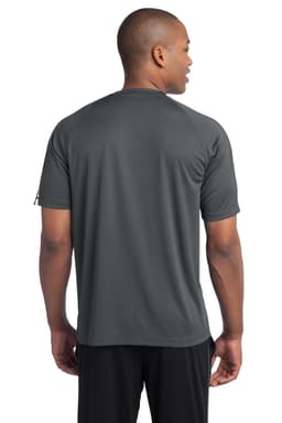 A grey Sport-Tek Colorblock PosiCharge Competitor Tee displayed from the back, featuring a logo on the sleeve.