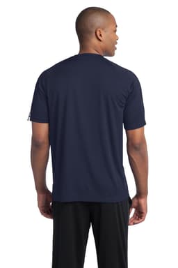 A man is wearing a navy blue Sport-Tek Colorblock PosiCharge Competitor Tee, showcasing the back view of the shirt.