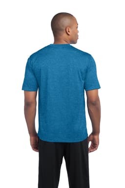 A man wearing a blue heather t-shirt, viewed from the back, paired with dark shorts. The shirt has a branding logo.
