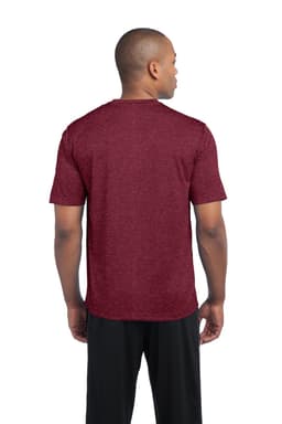 A man stands wearing a maroon Sport-Tek Heather Contender Tee, facing away from the camera. The shirt has a logo.