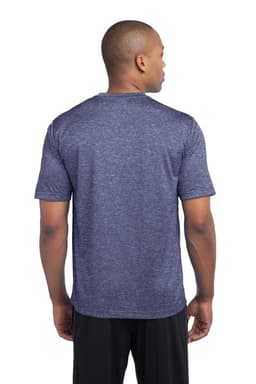 A man wearing a navy heather T-shirt with short sleeves, featuring a logo on the back.