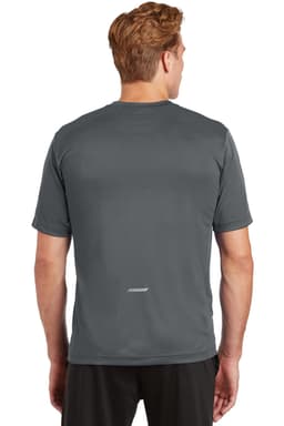 A grey Sport-Tek PosiCharge Elevate Tee displayed on a male model from the back, featuring a logo on the shirt.