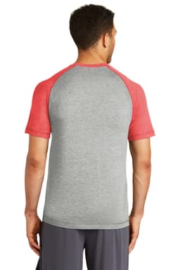 A back view of a grey and red Sport-Tek PosiCharge Tri-Blend Wicking Raglan Tee, featuring short sleeves and a logo.