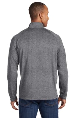 A man wearing a grey Sport-Tek Sport-Wick Stretch 1/2-Zip Pullover, showcasing the back view of the garment.