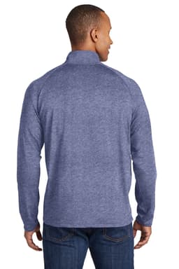 A man in a blue Sport-Tek Sport-Wick Stretch 1/2-Zip Pullover, viewed from the back, with a simple logo.