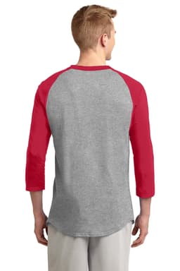 A grey Sport-Tek Colorblock Raglan Jersey featuring red sleeves, displayed from the back. Includes a logo.