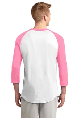 A man is wearing a Sport-Tek Colourblock Raglan Jersey with pink sleeves and a white body, featuring a logo on the back.