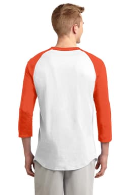 A white and orange Sport-Tek Colorblock Raglan Jersey featuring a logo on the back, with three-quarter sleeves.