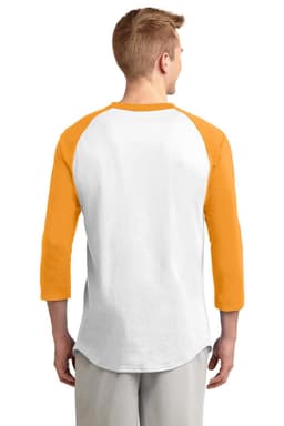 A man wearing a Sport-Tek Colourblock Raglan Jersey with white body and orange sleeves, featuring a logo on the back.