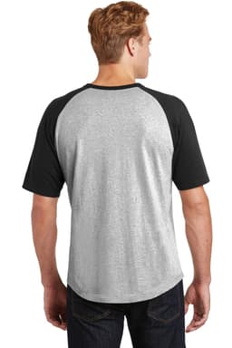 A grey and black short sleeve colourblock raglan jersey with a stylish design, featuring a logo on the back.
