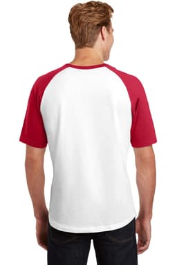 A short sleeve colourblock raglan jersey in white and red, with a logo on the back.