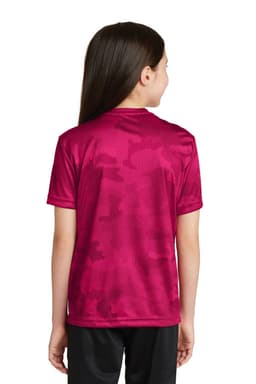 A youth t-shirt in bright pink with a camo pattern, featuring a logo on the back.
