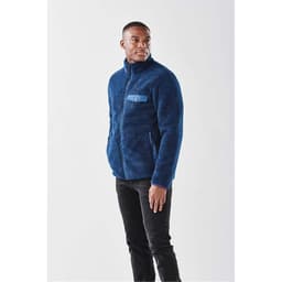 A men's Bergen Sherpa fleece jacket in navy blue with a chest pocket and a logo.