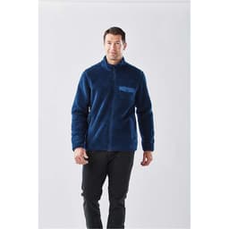 A men's navy Bergen sherpa fleece jacket with a zip front and a chest pocket, featuring a logo.