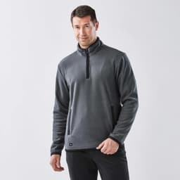 A dark grey men's fleece jumper featuring a quarter zip and a logo on the front.