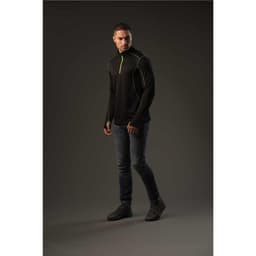 A men's black polar fleece pullover with green accents, displayed on a model against a dark background.