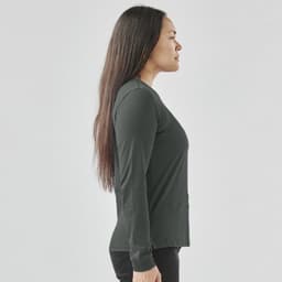 A long-sleeve women's t-shirt in dark green, displayed from the side with a fitted silhouette.