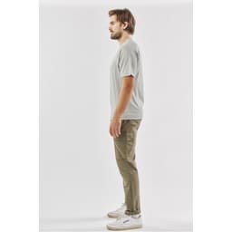 A light grey men's t-shirt displayed on a model, featuring a simple design and a logo.