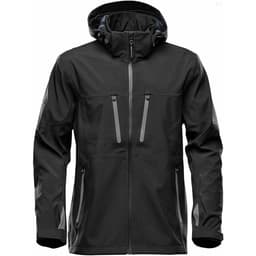 A black softshell jacket with a hood and multiple zippered pockets, featuring a logo on one sleeve.