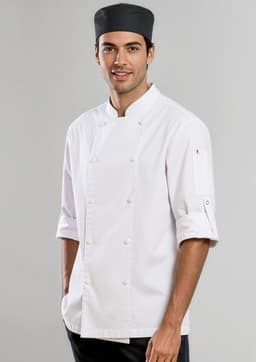 A white long sleeve chef jacket with a button-up front, worn by a man, paired with a black chef hat.