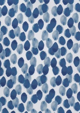 A fabric print featuring a blue and white pattern of organic, oval shapes resembling watercolour blobs.