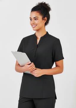 A black women's tunic with a short collar and pockets, featuring a model holding a clipboard.