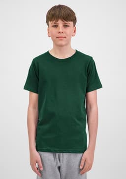 A youth short sleeve tee in dark green, displayed on a model wearing grey shorts. The shirt has a simple design and branding.