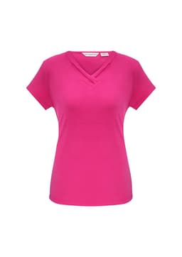 A pink short sleeve top with a V-neck design, featuring a subtle layered detail and a logo tag.