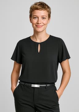 A black short sleeve blouse featuring a keyhole detail at the neckline, accompanied by a person wearing tailored trousers.